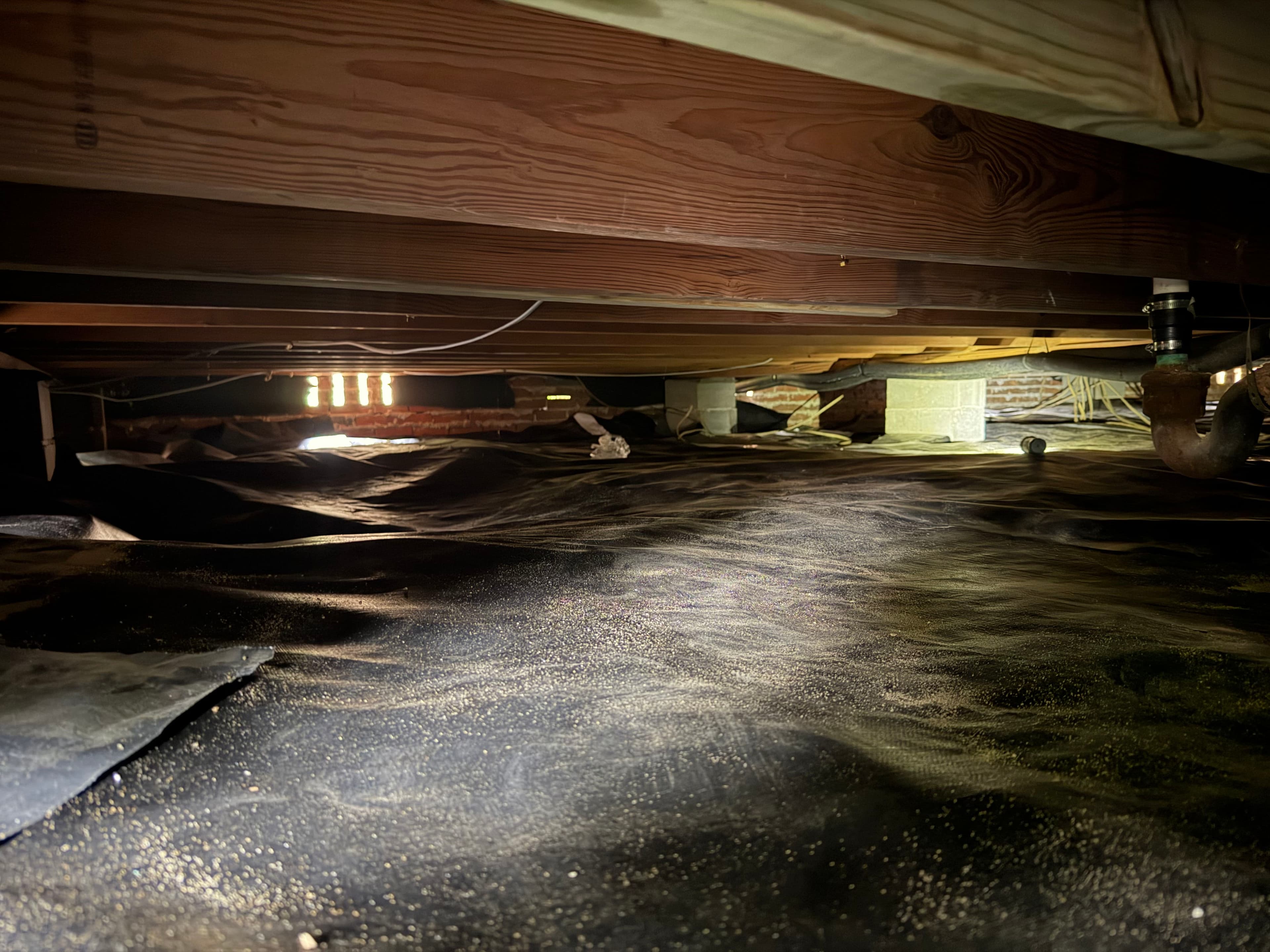 Project Tight Crawl Space Vapor Barrier Installation in Pensacola image