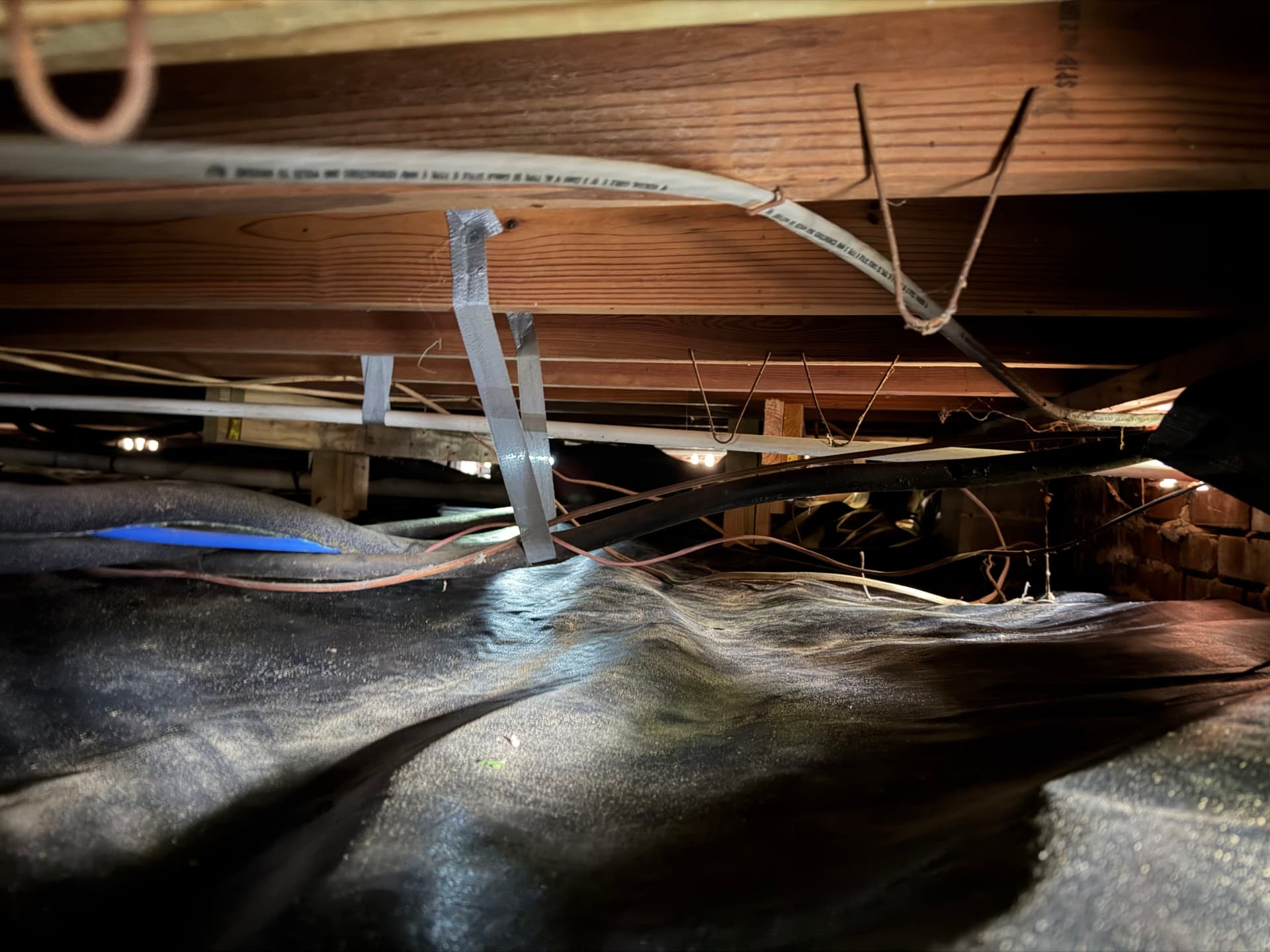 Gallery photos for Tight Crawl Space Vapor Barrier Installation in Pensacola: Image #1