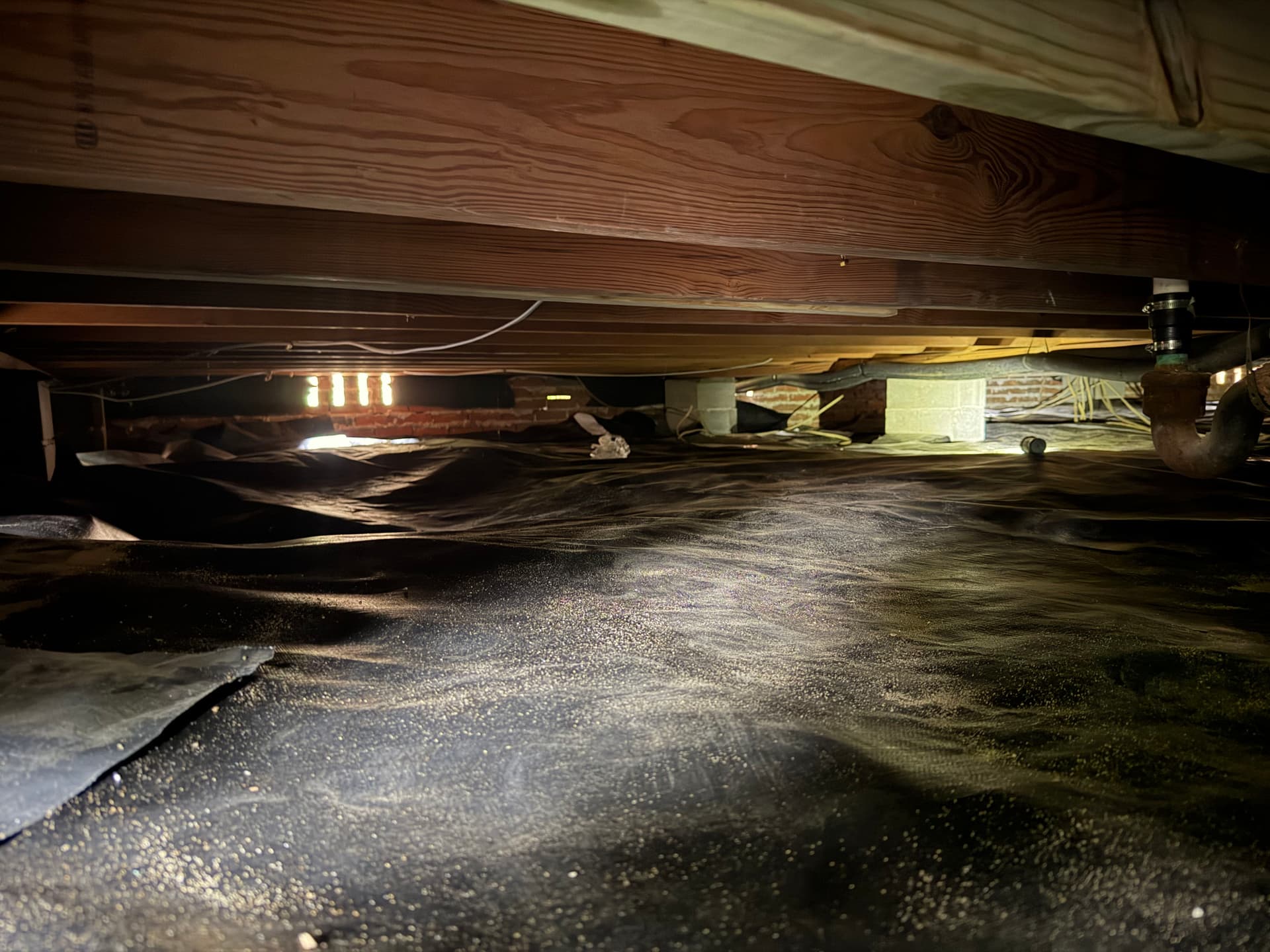 Tight Crawl Space Vapor Barrier Installation in Pensacola image